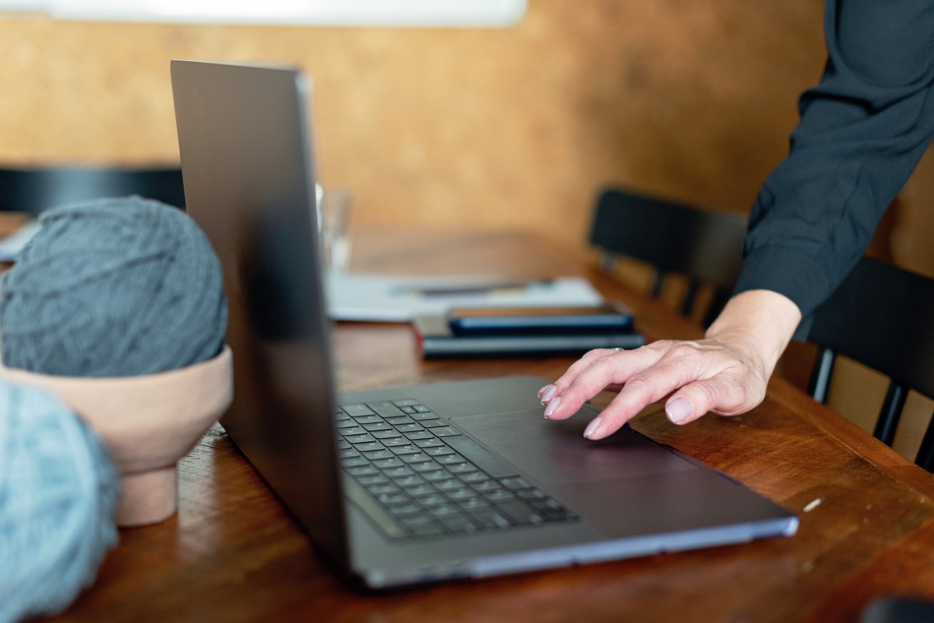 a close up shot of a person using a laptop
